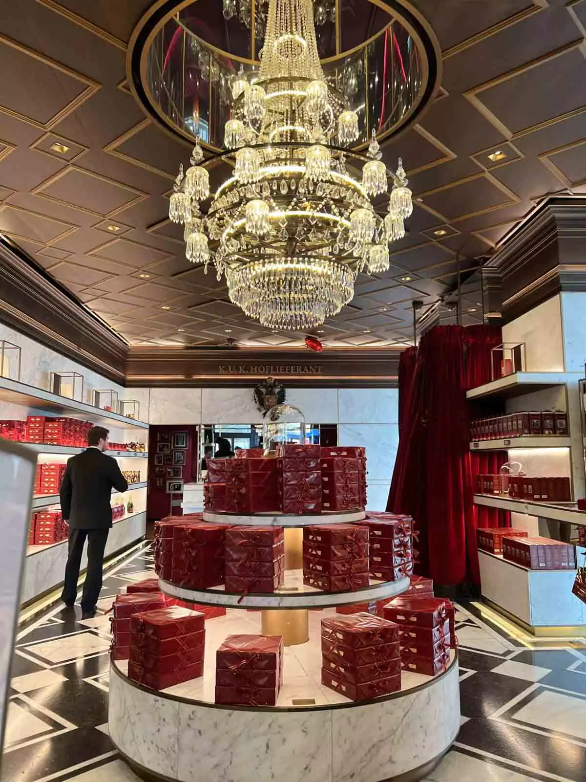 chandelier hanging from the ceiling inside Café Sacher
