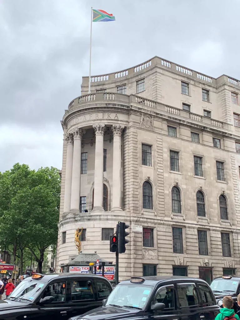 The grand exterior of Australia House in London, featuring ornate stone architecture with tall columns and intricate detailing. The building served as the filming location for Gringotts Bank in the Harry Potter movies, embodying a majestic and imposing presence.