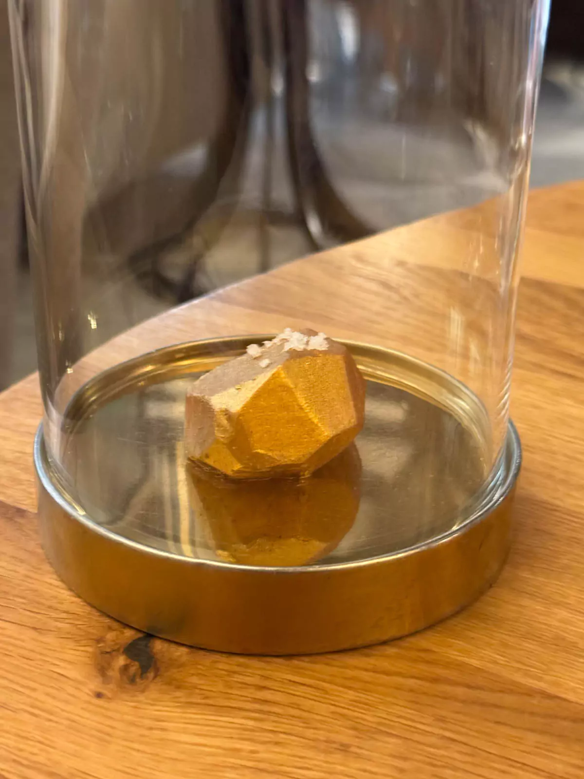 Philosopher’s Stone–shaped butter served at Auberge Nicolas Flamel in Paris, France, crafted as a playful nod to alchemy and the restaurant’s namesake, presented on a small stone slab before the meal.