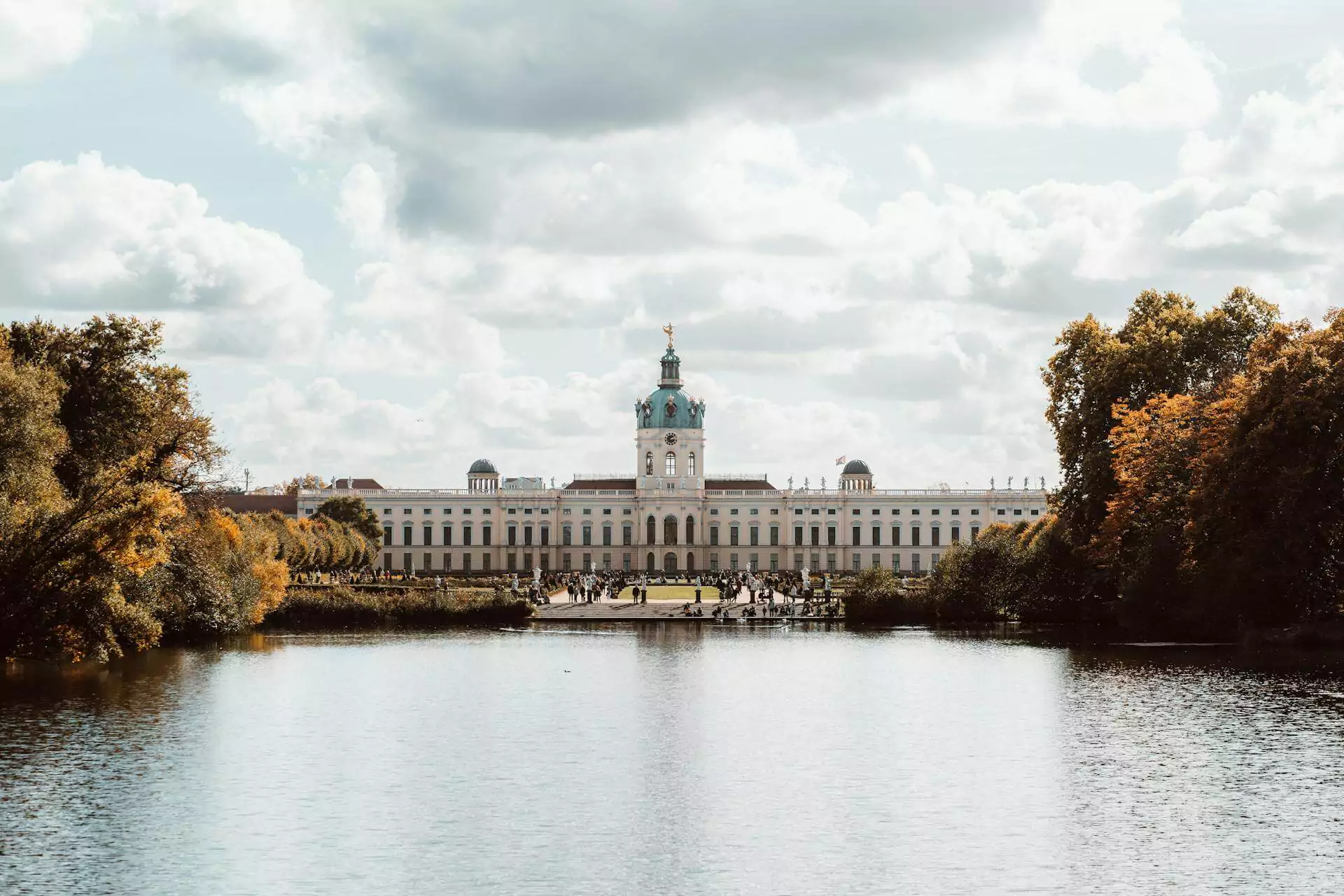 Charlottenburg Palace in Berlin, Germany, a grand Baroque residence with a central dome, ornate façades, and manicured gardens, once the summer home of Prussian royalty.
