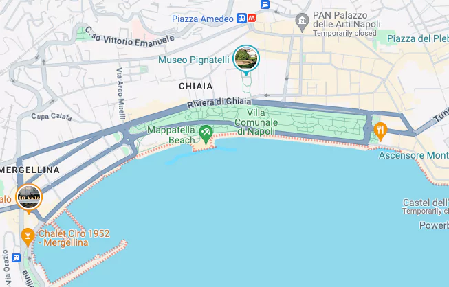 Map of the Chiaia area in Naples, Italy, highlighting its coastal location, upscale shopping streets, historic piazzas, and proximity to the waterfront promenade