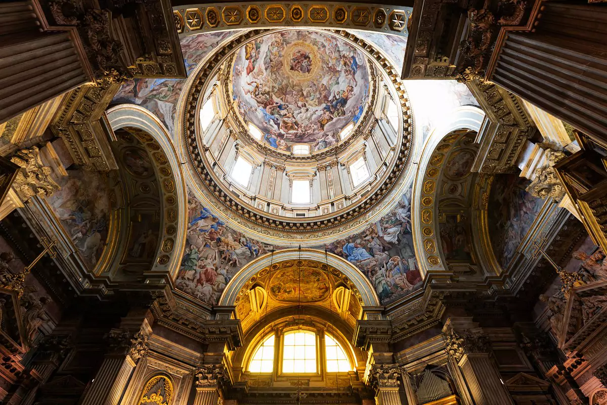 Entrance to the Museo del Tesoro di San Gennaro in Naples, Italy, home to the treasured relics and ornate jewelry of the city’s patron saint, featuring elegant signage and historic stone architecture.