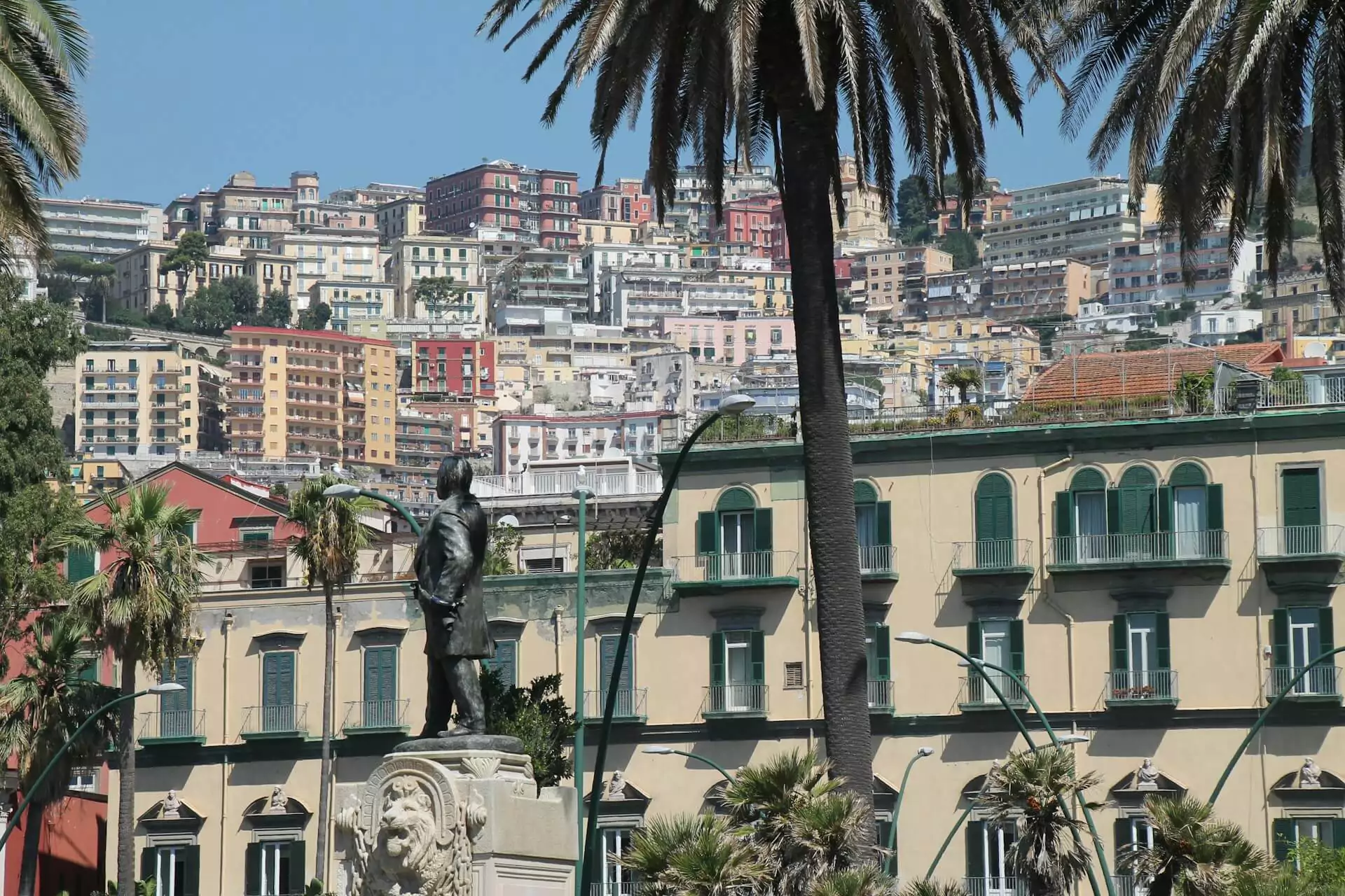 Statue in the Vomero neighborhood of Naples, Italy, set against a backdrop of leafy streets and elegant buildings, representing the district’s blend of history, art, and residential charm.