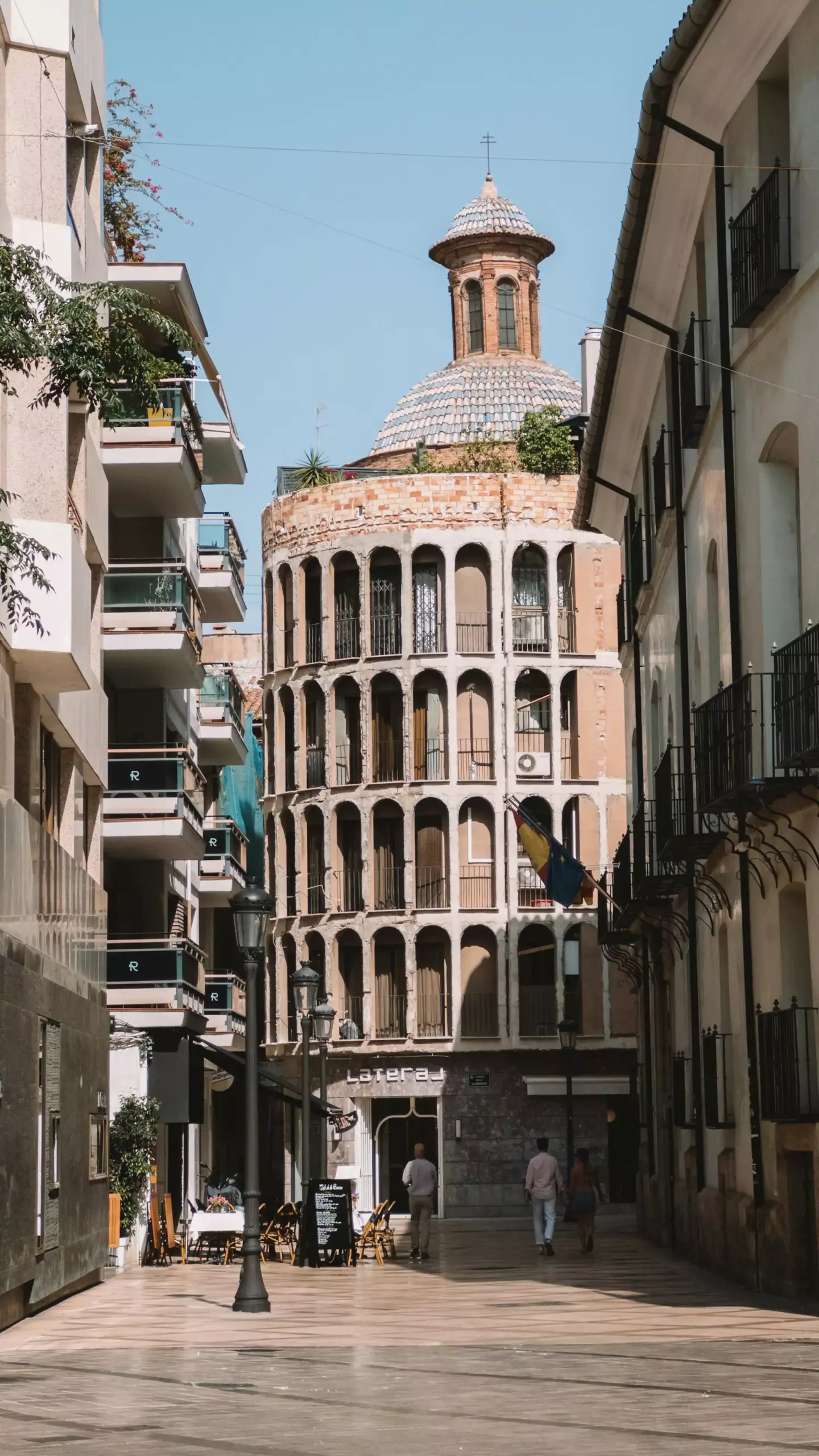 Contarini del Bovolo Palace in Venice, Italy, featuring its famous external spiral staircase, the Scala Contarini del Bovolo, with arched loggias and intricate Venetian Gothic architecture tucked away in a quiet courtyard.