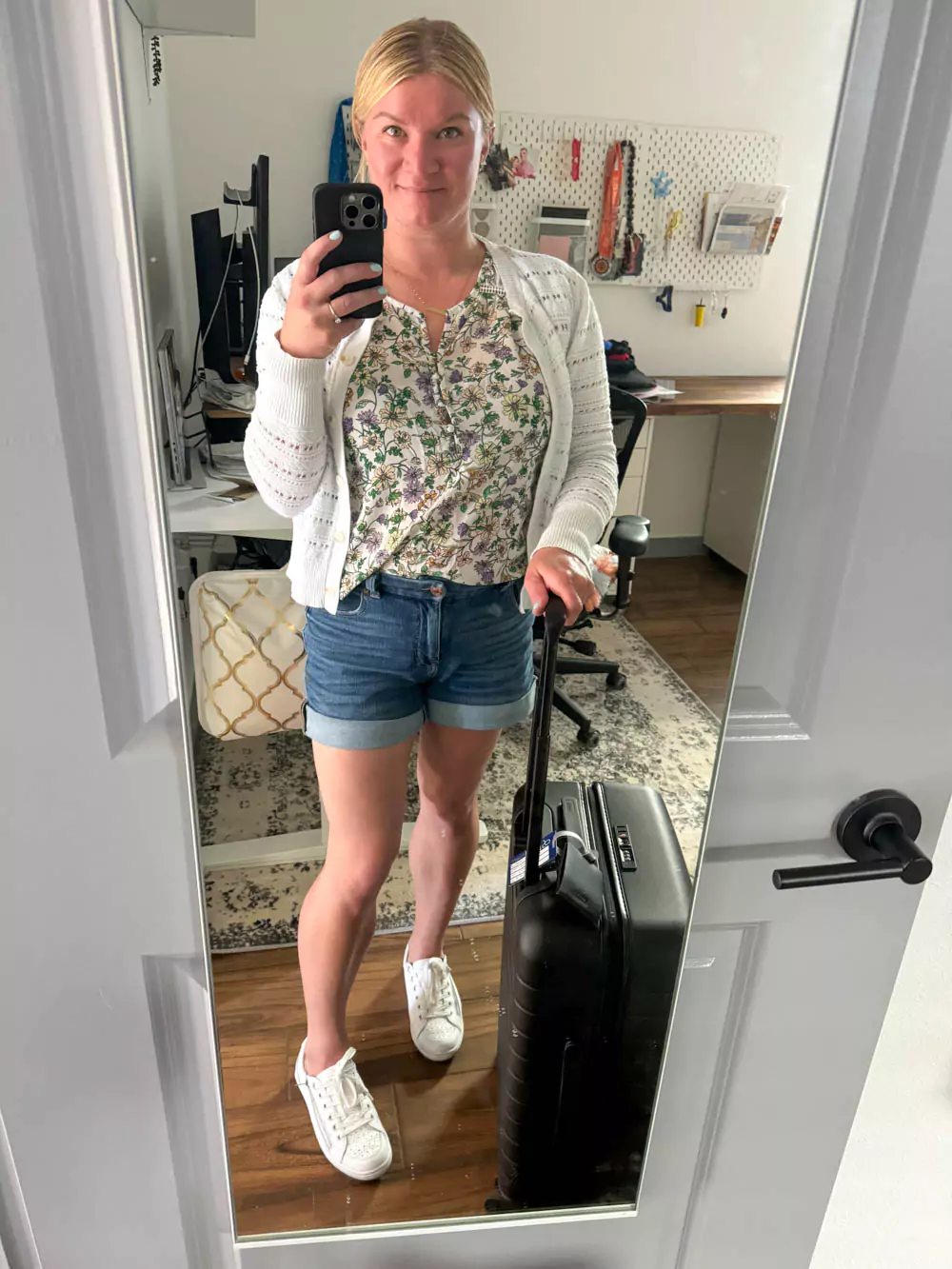 Katie in her airport outfit for Tulum, wearing breezy neutral layers, comfy sandals, and a tote bag, styled for tropical travel and featured as part of a tulum-packing-list — a chic and practical look