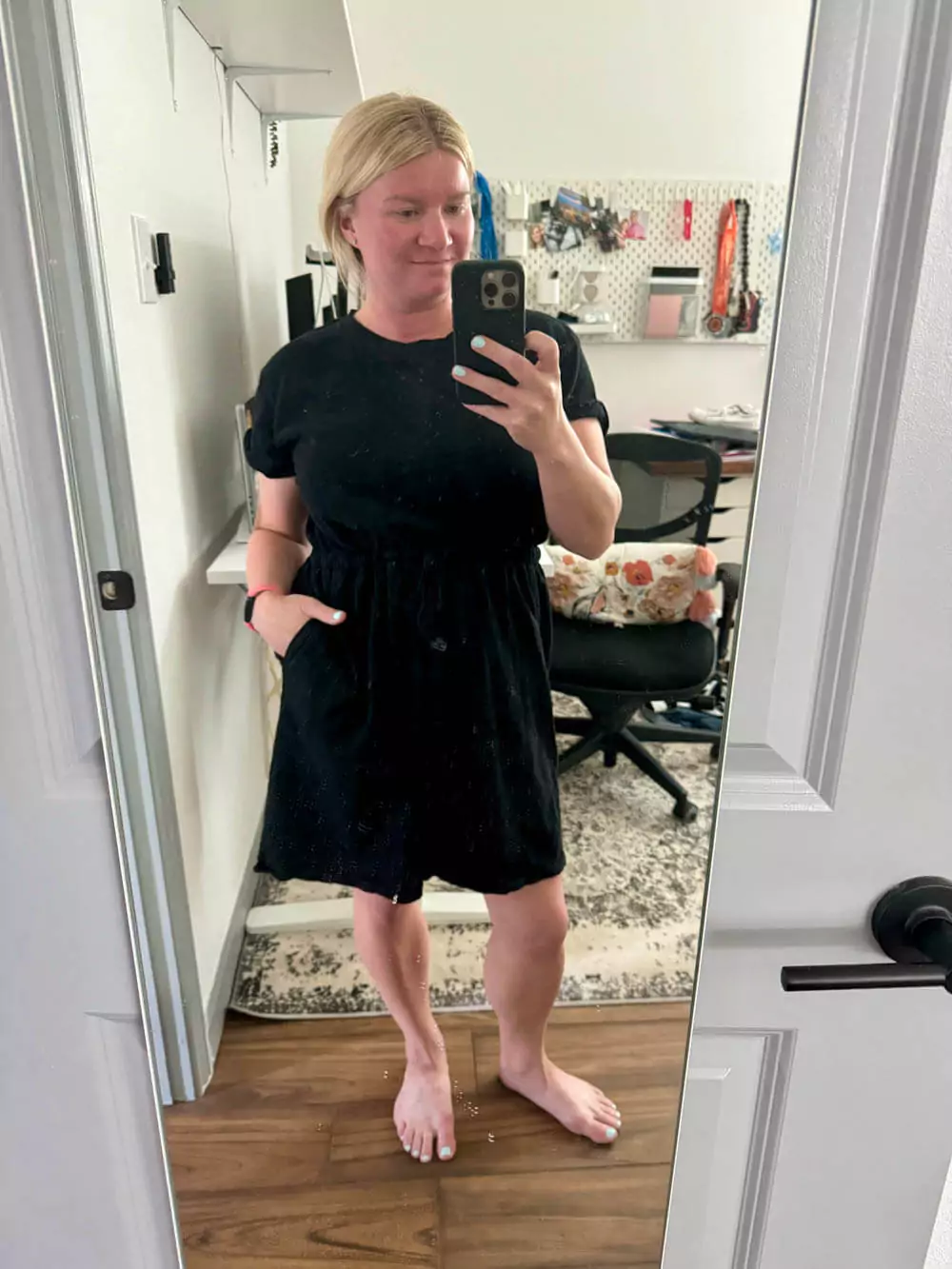 Black drawstring waist dress.