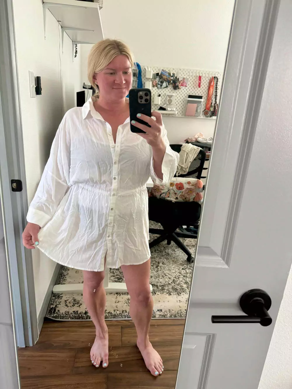 Drawstring cover-up paired with a black and white color block bikini.
