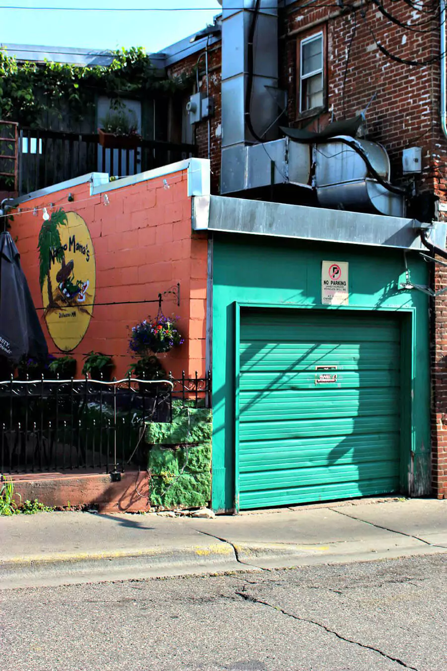 Exterior of Nacho Mamas in Stillwater, Minnesota, a vibrant Tex-Mex restaurant with colorful signage and a lively, casual vibe. Located on Main Street, it’s a popular local spot for bold flavors and festive atmosphere.