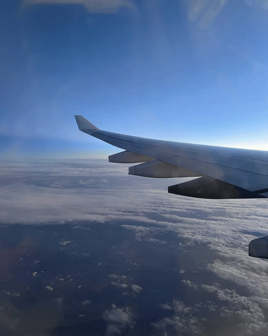 View from an airplane window over the wing over Germany